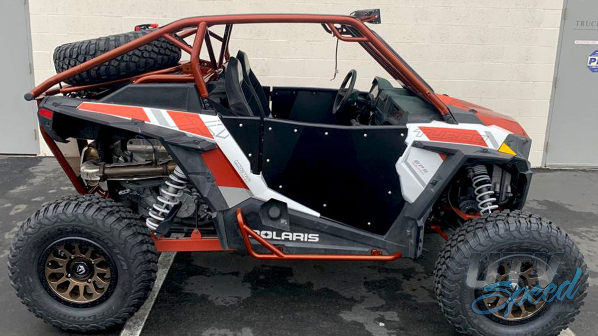 Opening Spare Tire Mount with shocks for the Polaris RZR 1000 by UTV Speed